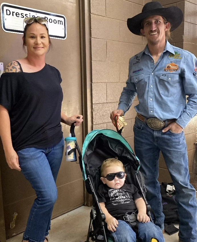 Elizabeth Courson has always been supportive of her husband's (Ernie Courson) career and travels with him and the boys. Youngest son Ryder is pictured with his mom and dad.